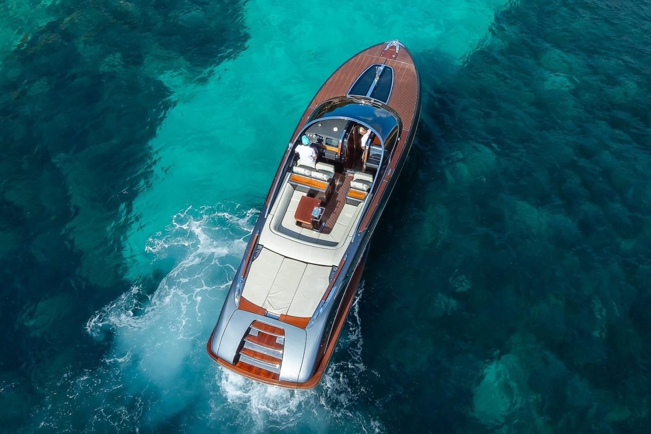 Aerial view of the Riva 38 Rivamare over turquoise water
