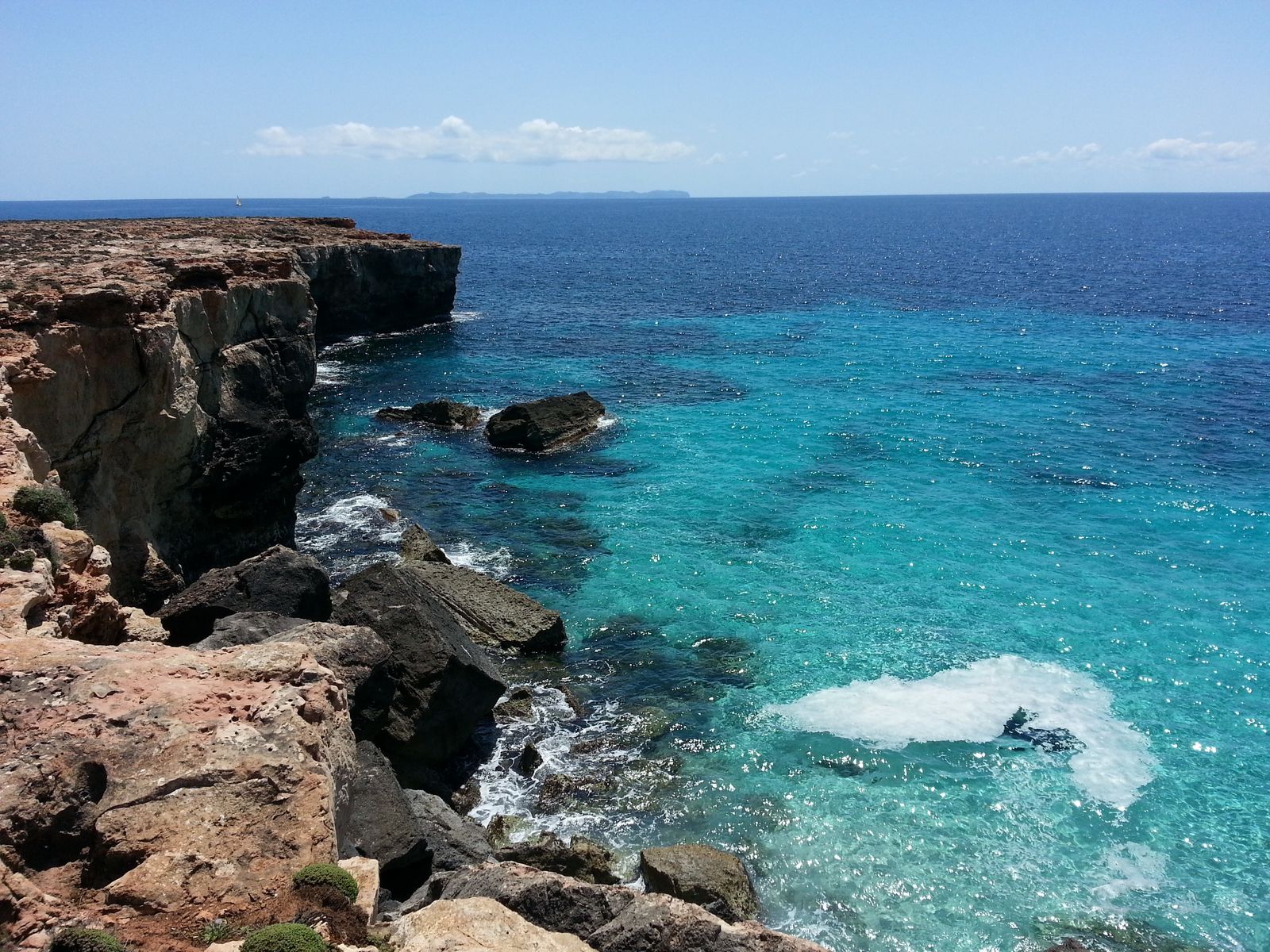 Hidden beach cove with crystal turquoise water in Mallorca